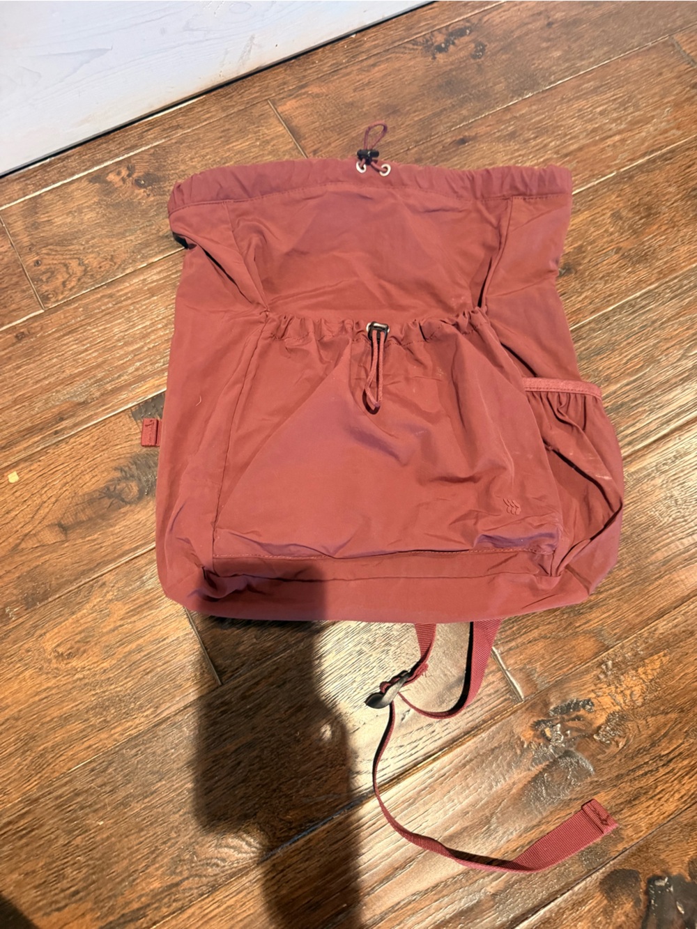 all in motion maroon Drawstring Backpack